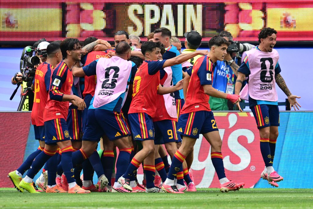 Spain beats Belgium in World Cup quarter-finals.