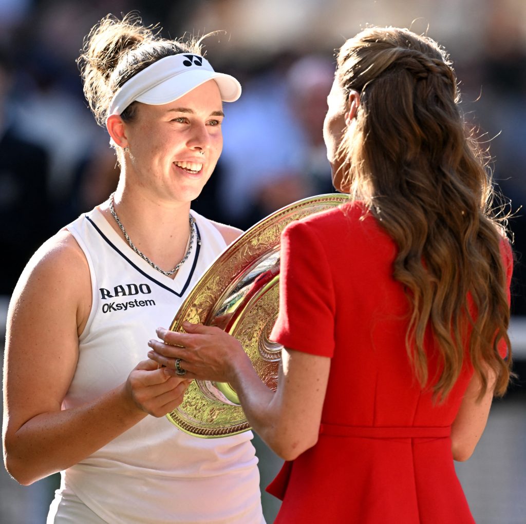Britain's Catherine, Princess of Wales gives the Venus Rosewater Dish to Linda Noskova .