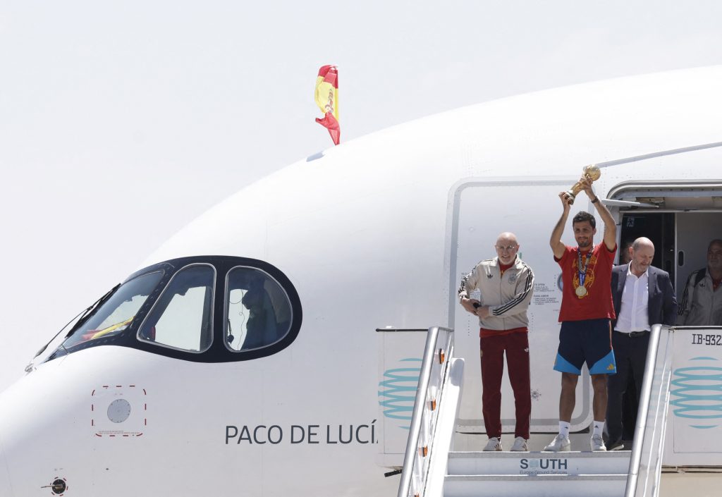 Spain's World Cup winners arrive home.