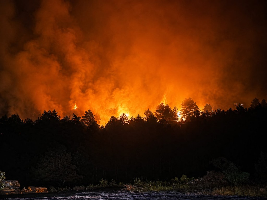 A wildfire that broke out on July 16 in La Mierla area, near Guadalajar has devastated more than 29,000 hectares and caused the evacuation of several hundred people. (Photo by Handout / UME / AFP)