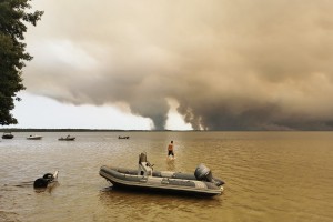 Wildfires rage across western Europe as evacuation numbers climb