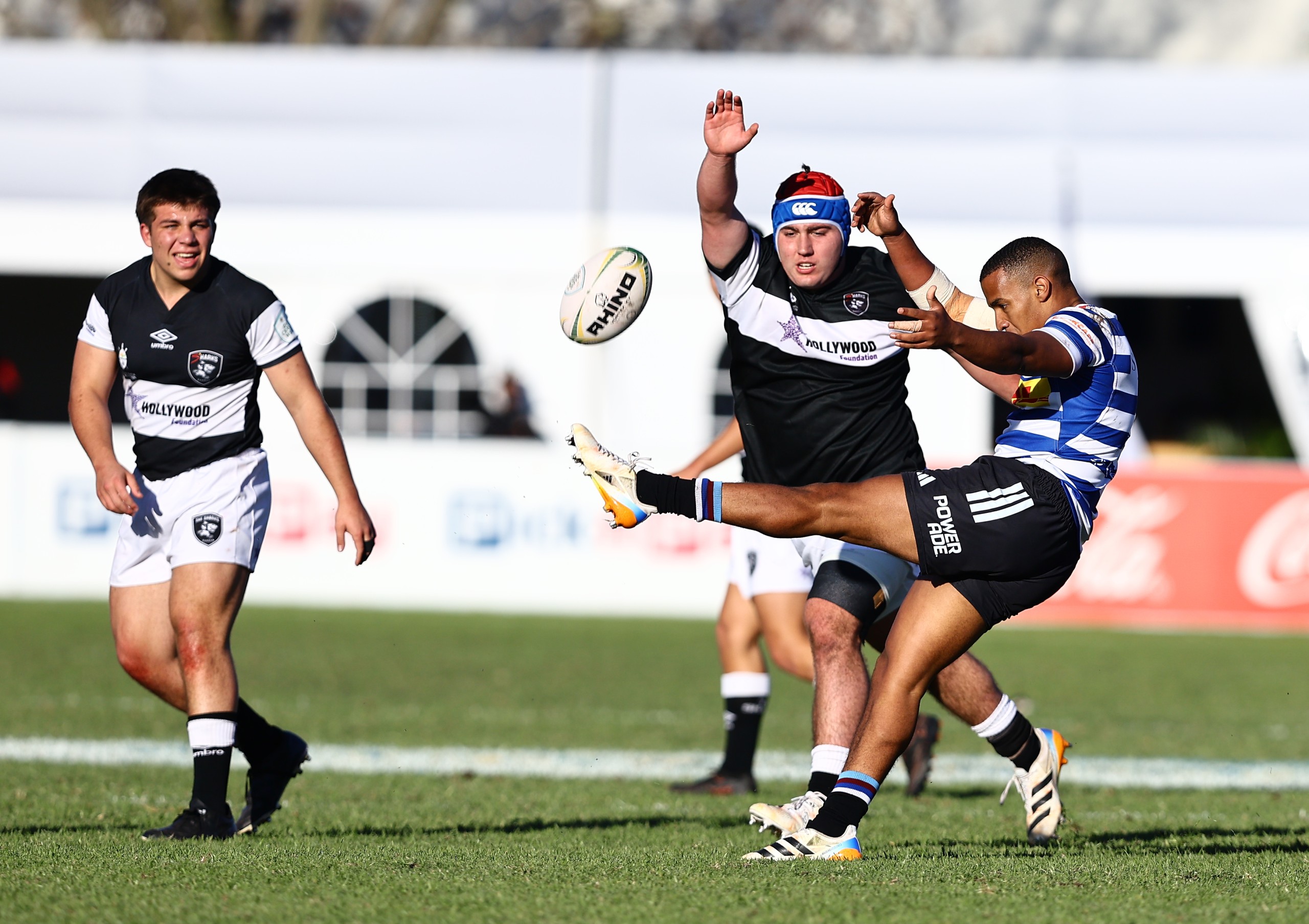 Nicolas Salamousas of Sharks attempts to block Mickyle Booise of Western Province’s kick during the match between Western Province and Sharks at the FNB Craven Week.