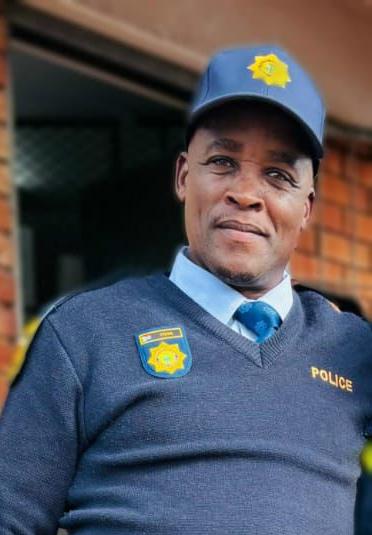 Police officers pay their final respects to Sergeant Phumelele Tyuwa in Peddie.