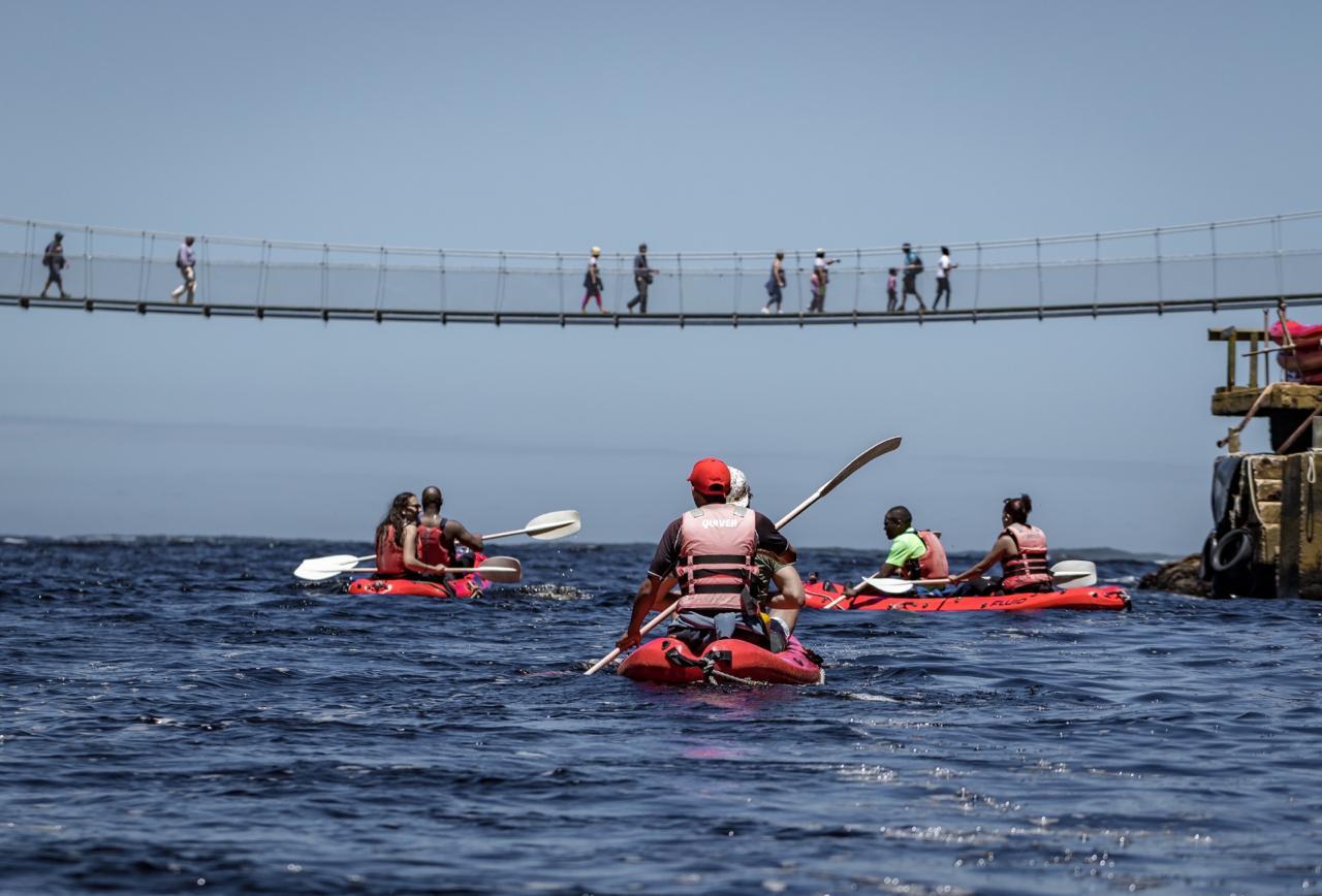 Visitors cross the Storms River Suspension Bridge as refurbishment work continues.