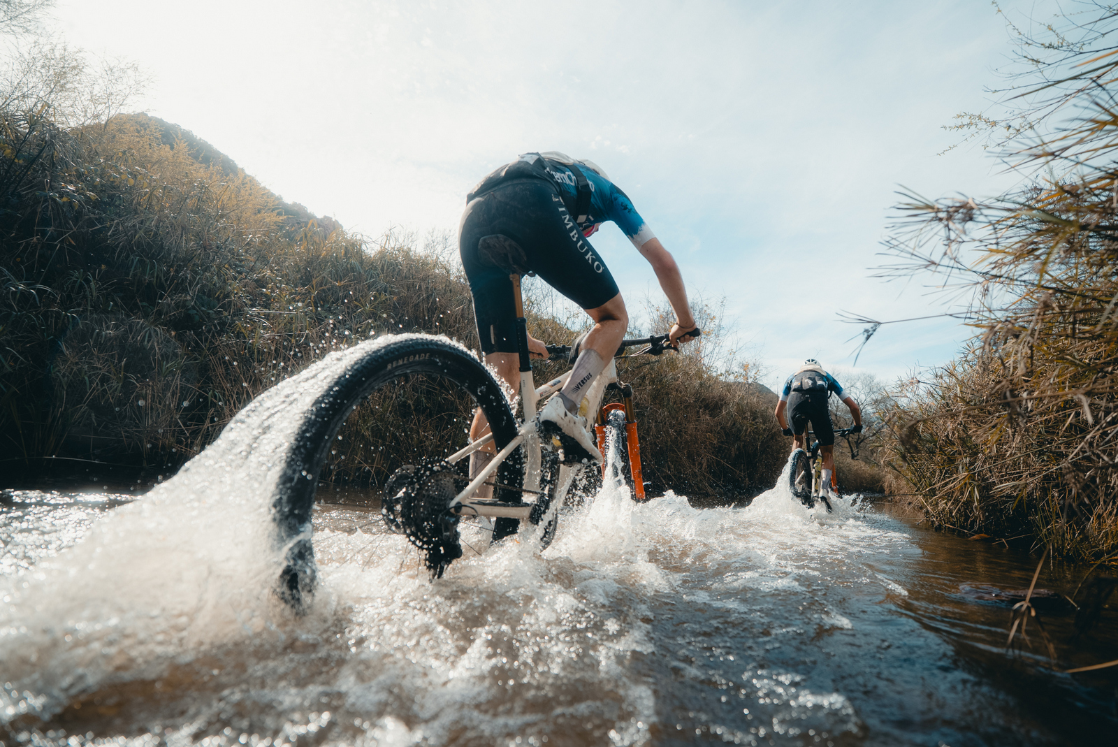 Mountain bikers competing in the Trans Baviaans 24-hour MTB race through the Baviaanskloof Nature Reserve.