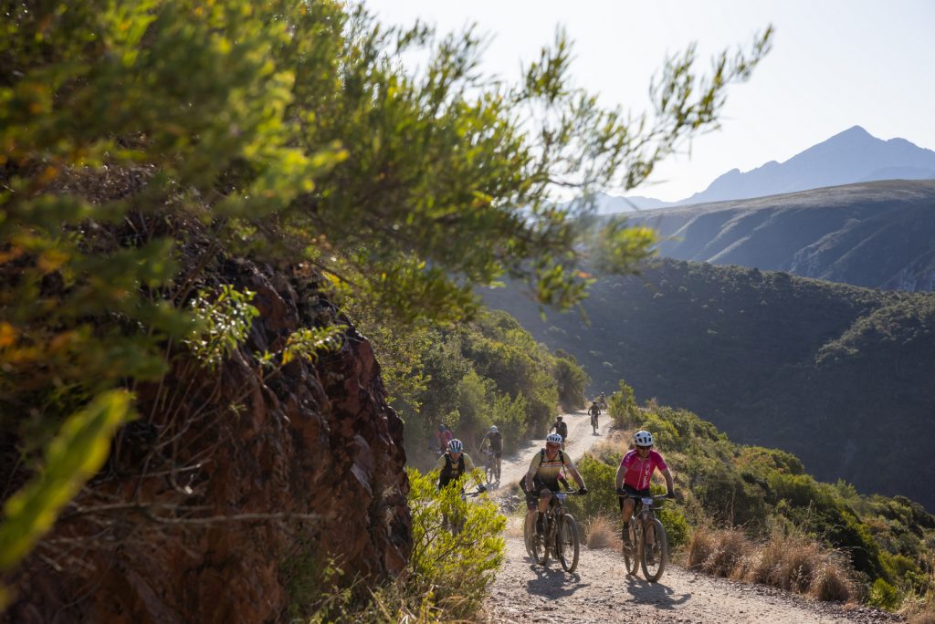 Mountain bikers competing in the Trans Baviaans 24-hour MTB race through the Baviaanskloof Nature Reserve.