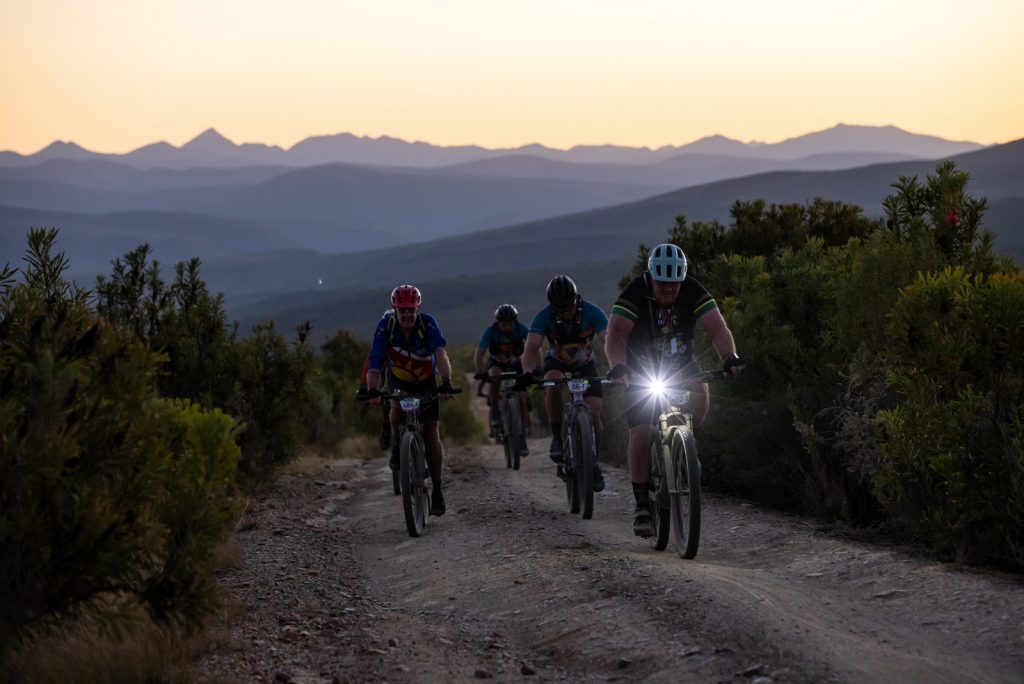 Mountain bikers competing in the Trans Baviaans 24-hour MTB race through the Baviaanskloof Nature Reserve.