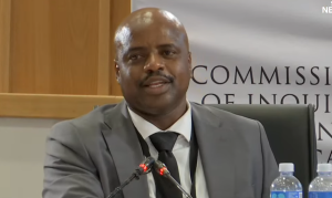 Suspended metro police boss and former girlfriend charged in R15 million precious stones heist