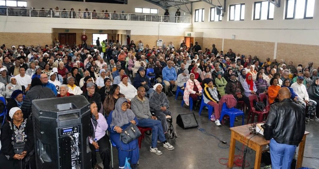 Hundreds of pensioners met in Cedar High School hall to plan pickets against the low senior citizens grant they receive.