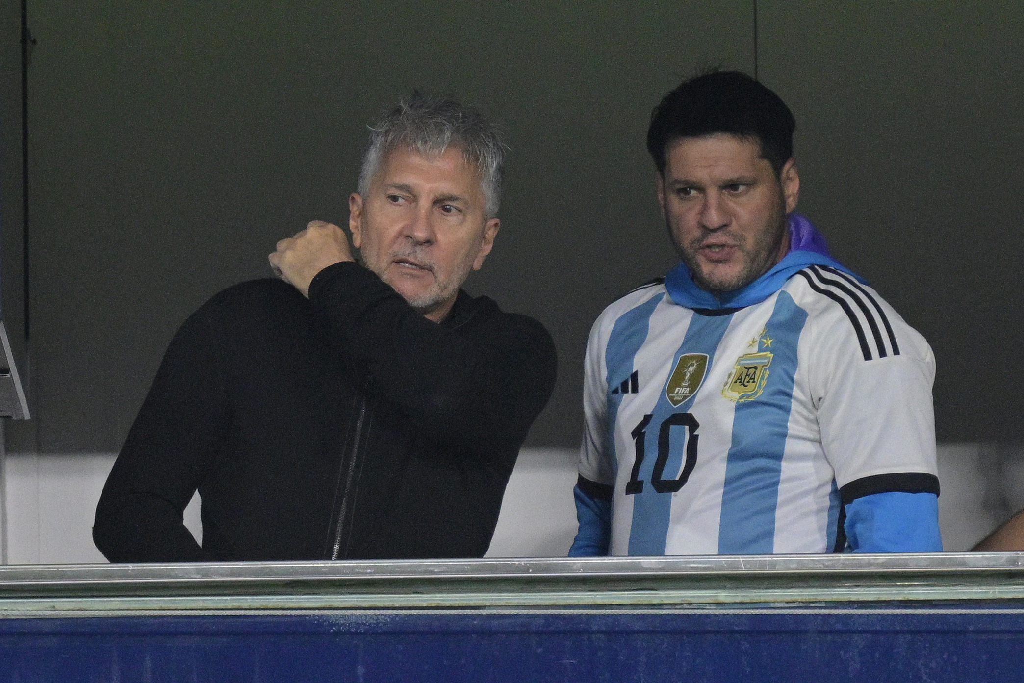 Argentina's forward Lionel Messi's father, Jorge Messi (L), and brother Rodrigo Messi wait for the start of the 2026 FIFA World Cup South American qualifier football match between Argentina and Peru at La Bombonera stadium in Buenos Aires on November 19, 2024. Jorge Messi, the father and agent of global football star Lionel Messi, has died aged 68 in Rosario, his hometown north of Buenos Aires, Newells Old Boys  the club where the Argentine captain played as a child  announced on August 8, 2026. (Photo by JUAN MABROMATA / AFP)