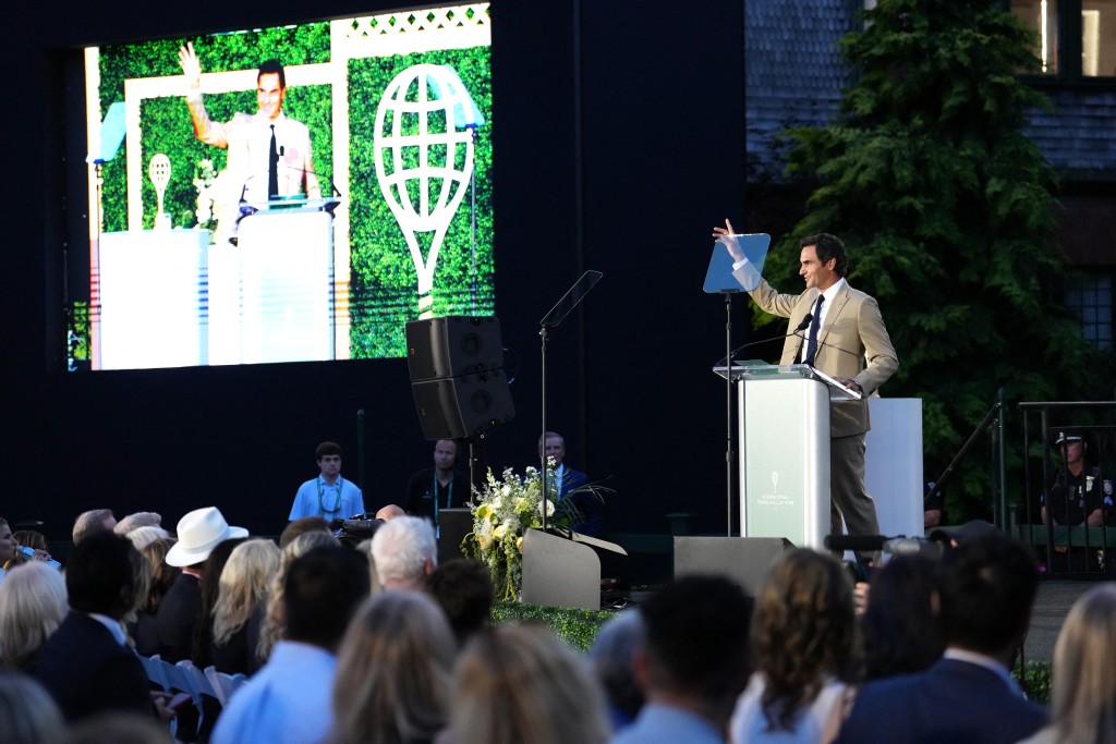 Inductee Roger Federer delivers a speech during the International Tennis Hall of Fame 2026 induction ceremony on Saturday 29 August. Photo: Joe Buglewicz