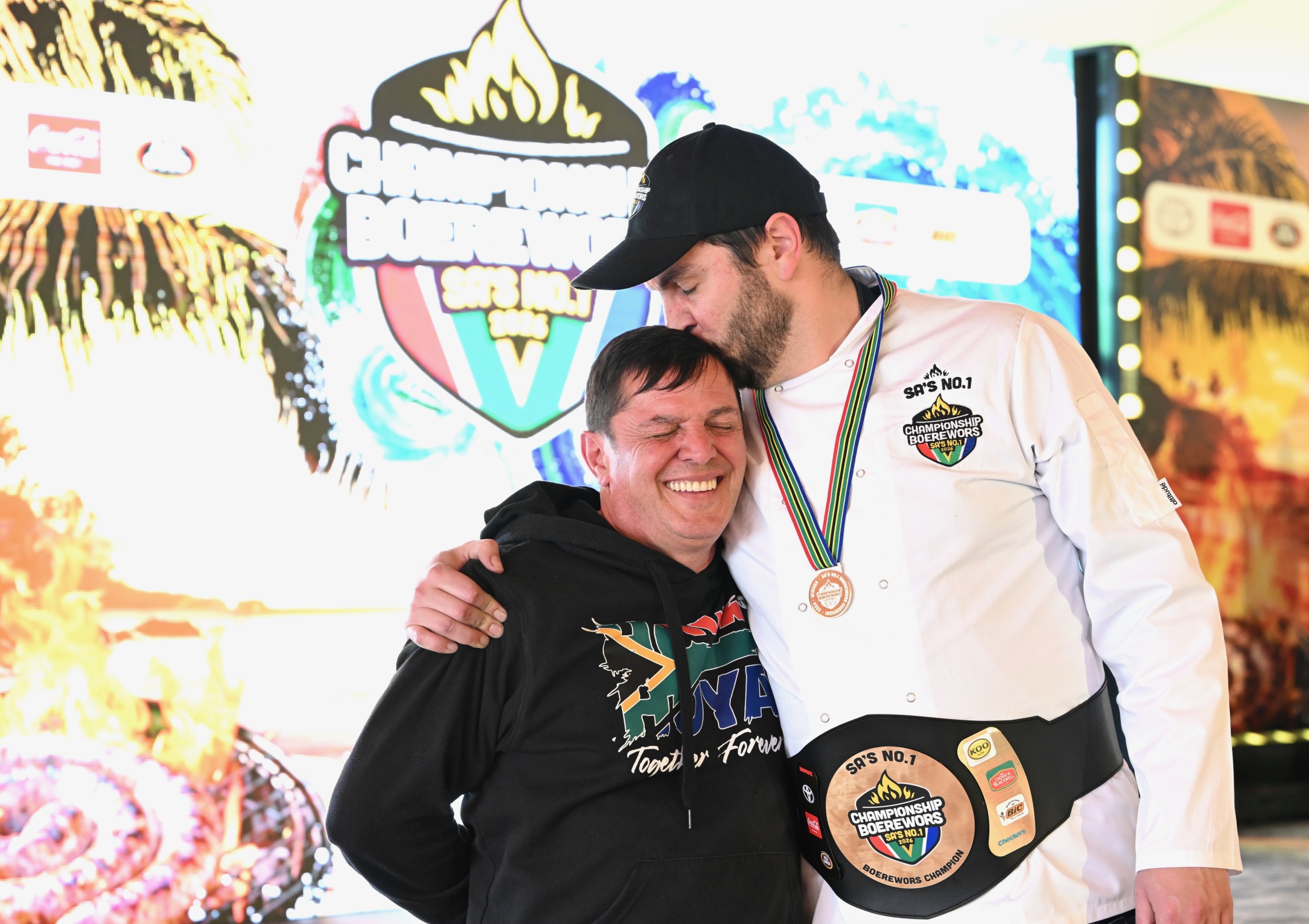Boerewors champion Dean De Sousa and his father.