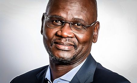 Patrick Dlamini has been reinstated as chief executive of the Public Investment Corporation following a court ruling that declared his suspension unlawful