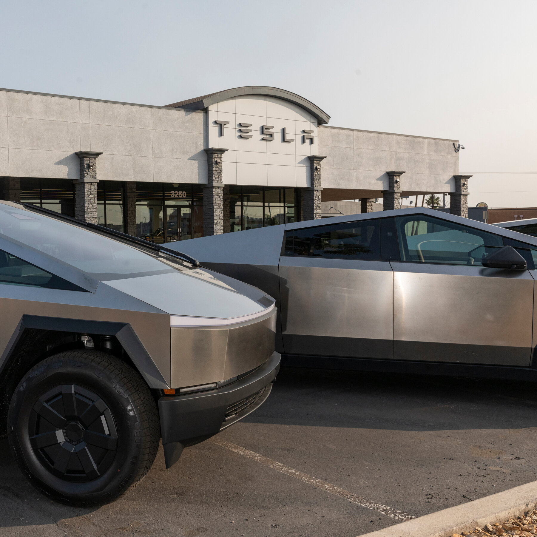 Tesla and eight Chinese carmakers recall millions of vehicles over door handles that could prevent occupants escaping during emergencies.