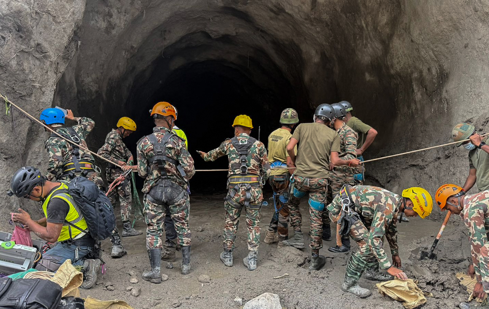 Rescuers struggle through mud and debris on 31 August as the number of missing people soars to nearly 5 000 since tsunami-like glacial floods roared down from the China-Nepal border, creating an "unimaginable" disaster.