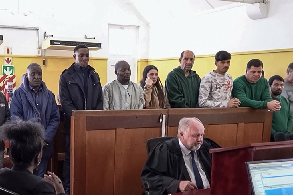 The court appearance of five Mexican nationals. Photo: AFP