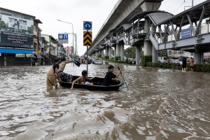 Canals full, roads submerged as Bangkok declares flood disaster