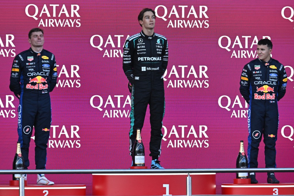 George Russell, Max Verstappen and Isack Hadjar on the podium at the Azerbaijan Grand Prix. Photo: Igor Ivanko/AFP