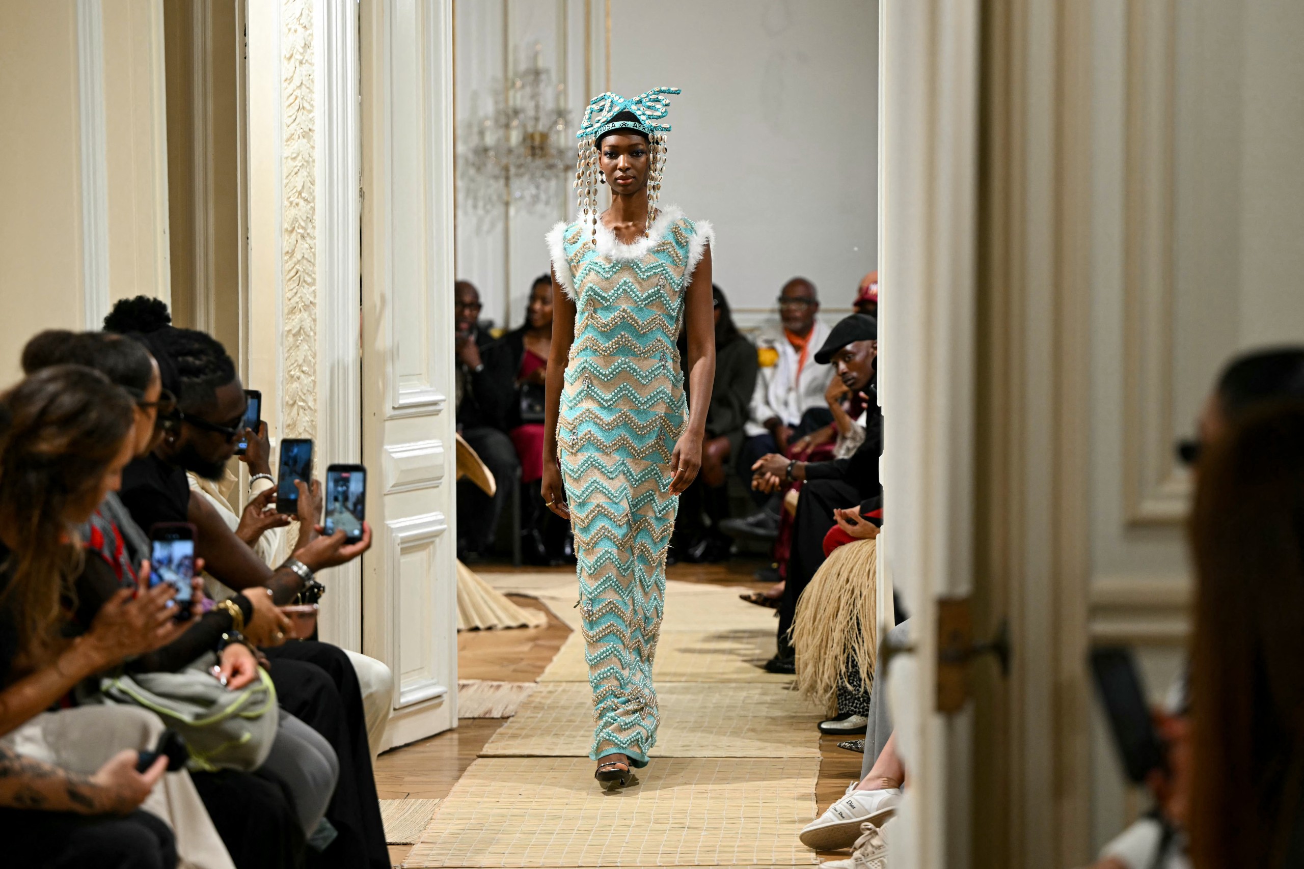 A model presents a creation by MaXhosa Africa for the Women's Spring/Summer 2027 collection fashion show as part of the Paris Fashion Week, in Paris. Photo: Lou Benoist / AFP