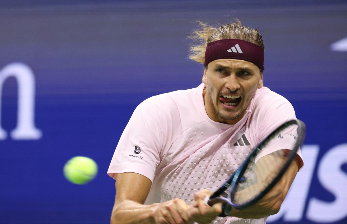 Alexander Zverev hits a return to Chile's Alejandro Tabilo during their men's singles third-round US Open match.