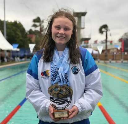 Ava Lorenzen Shines at CANA Zone 4 swimming championships
