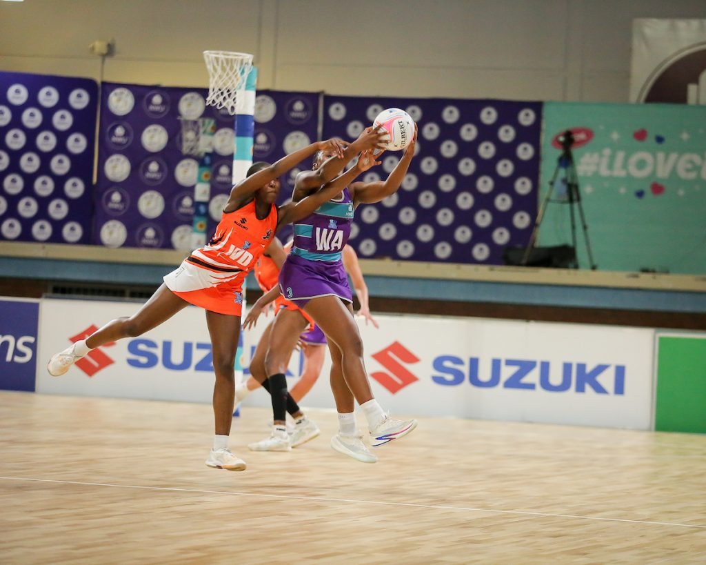 UJ and NWU players battle for the ball