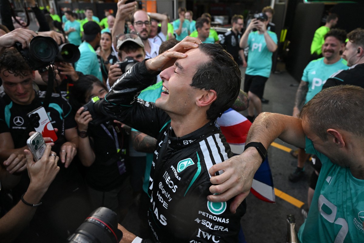 Winner Mercedes' British driver George Russell celebrates after the Formula One Azerbaijan Grand Prix