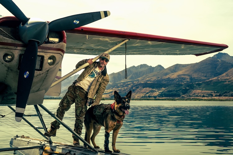 James Belmont, played by Brad Pitt, with Odin, portrayed by German shepherd named Uber, in Heart of the Beast. 