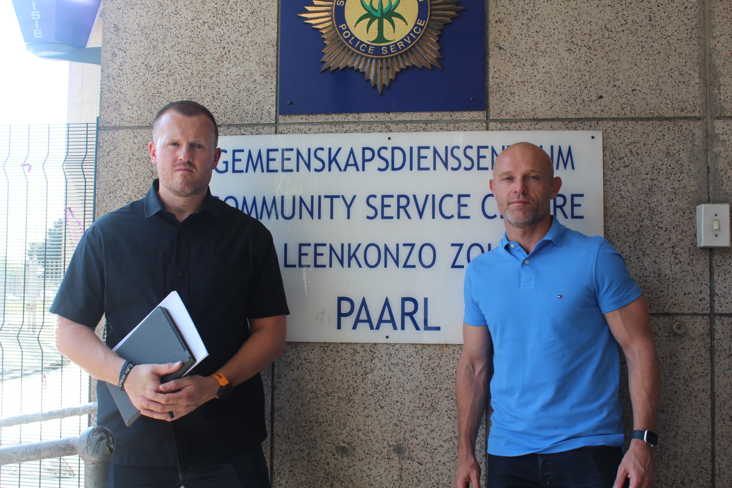 Ian Cameron and Nicholas Gotsell outside Paarl SAPS on Tuesday (8 September). Photo: Chantélle Hartebeest