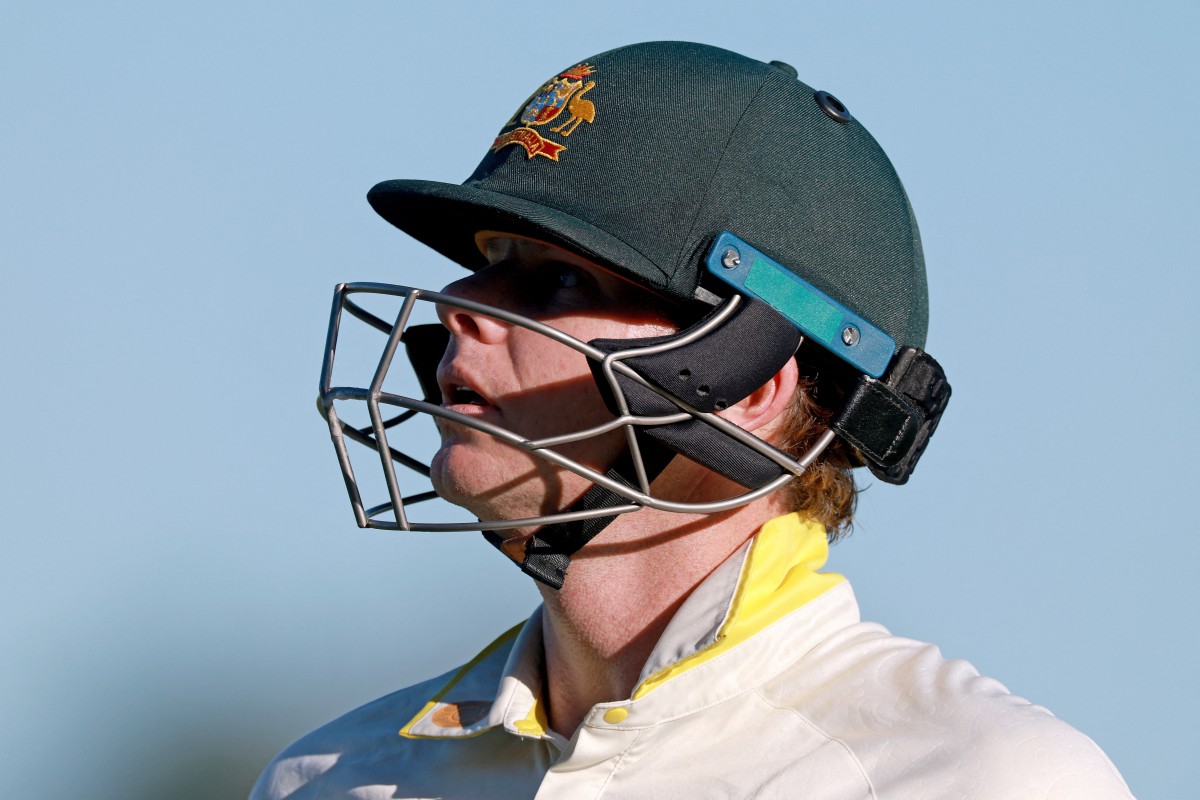 Australia's Steve Smith reacts as he walks off the ground after being dismissed LBW during the first day of the second cricket Test match between Australia and Bangladesh