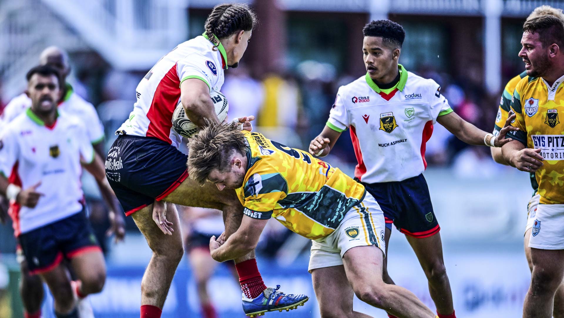Giuliano de Franchi of Villager FC tackled by Jack Hart of the Naka Bulls during the Pick n Pay Gold Cup, final