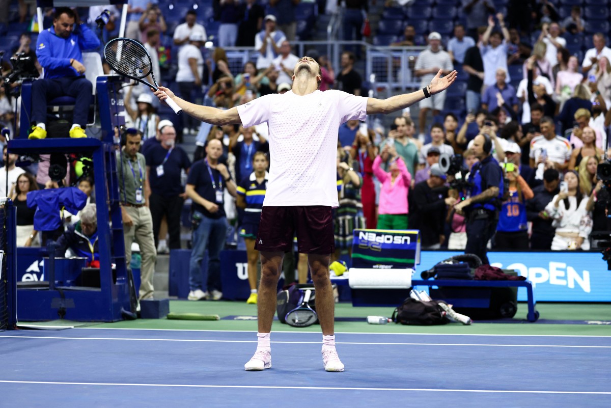 Germany's Alexander Zverev celebrates after defeating Italy's Lorenzo Sonego during the men's singles first-round tennis match on day three of the US Open