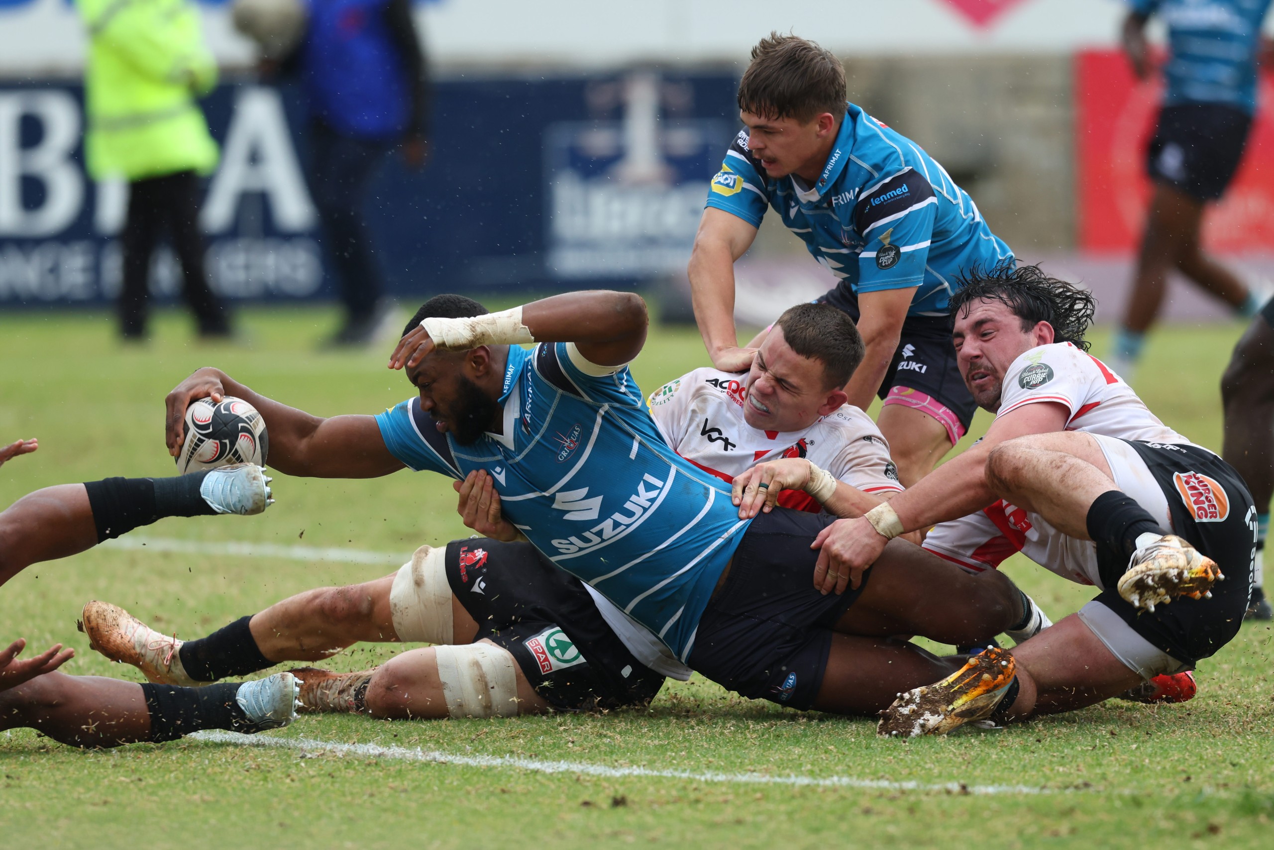 Mnombo Zwelendaba busts through the Lions defence.