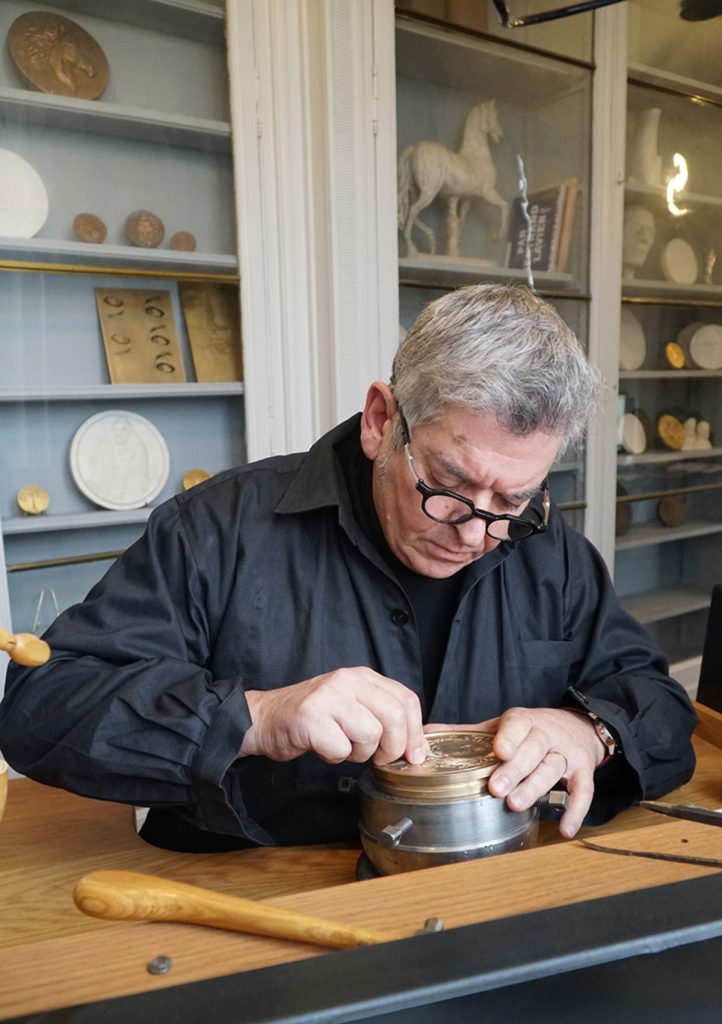 Joaquin Jimenez engraving the 10-euro coin featuring South Africa's Cape Floral Kingdom.