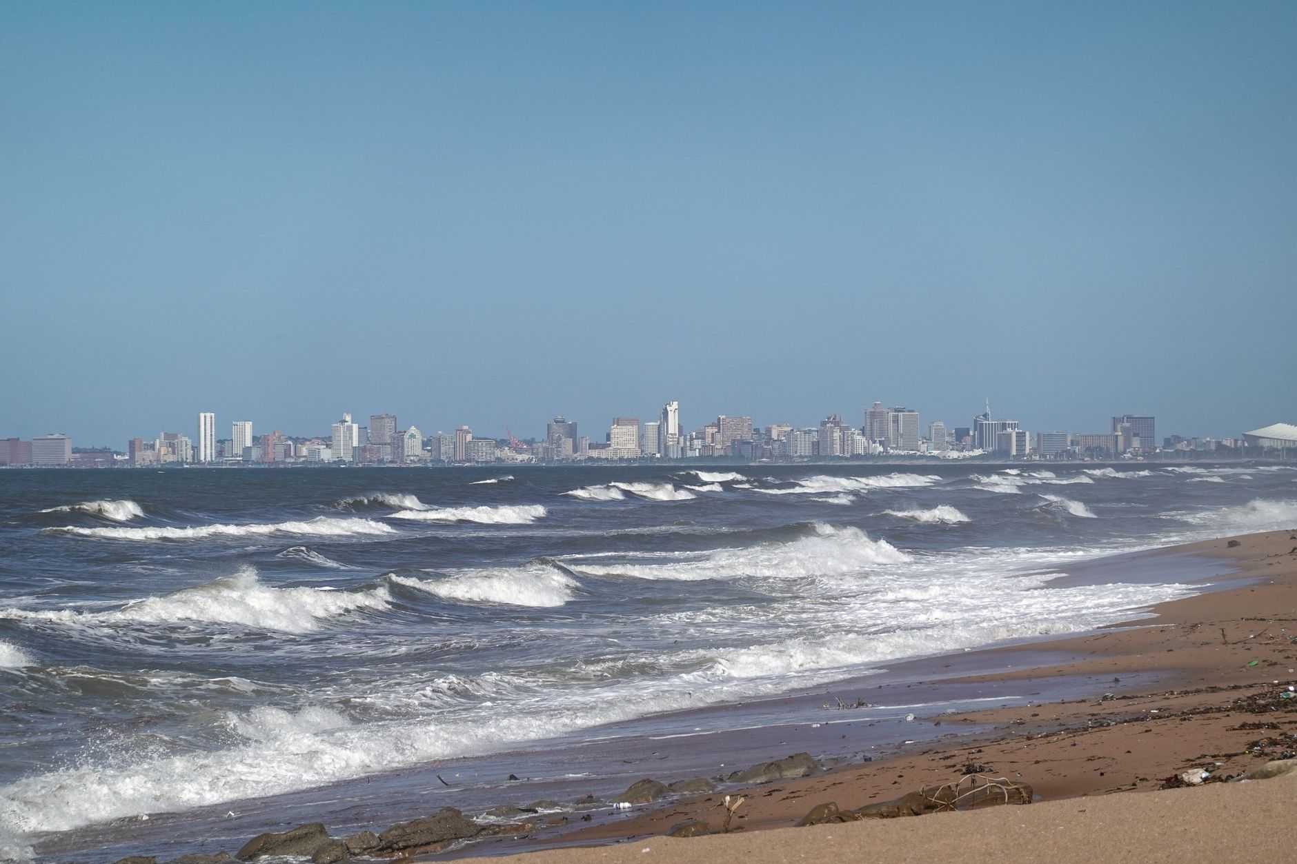 body of water near city buildings
