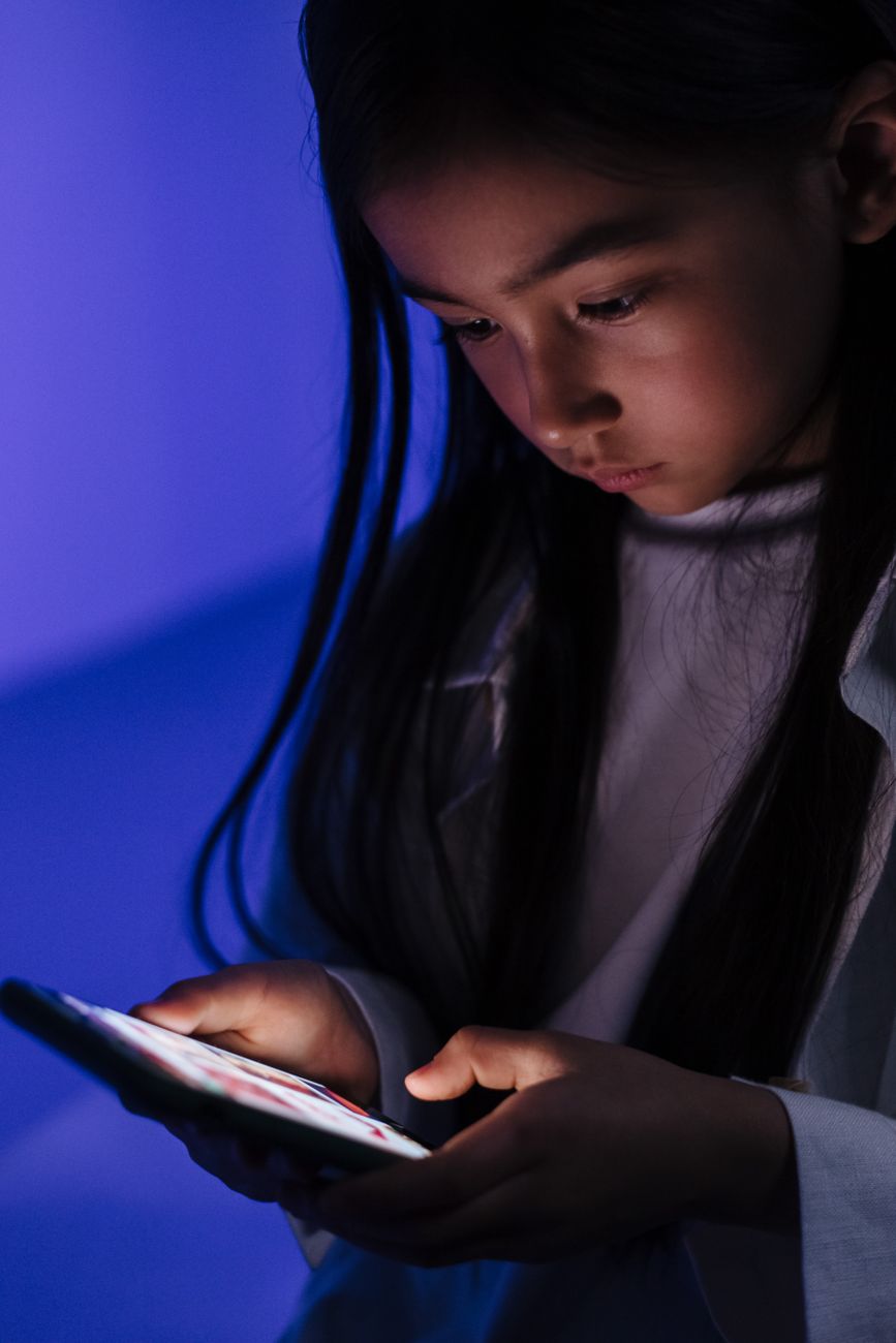 young girl using smart phone
