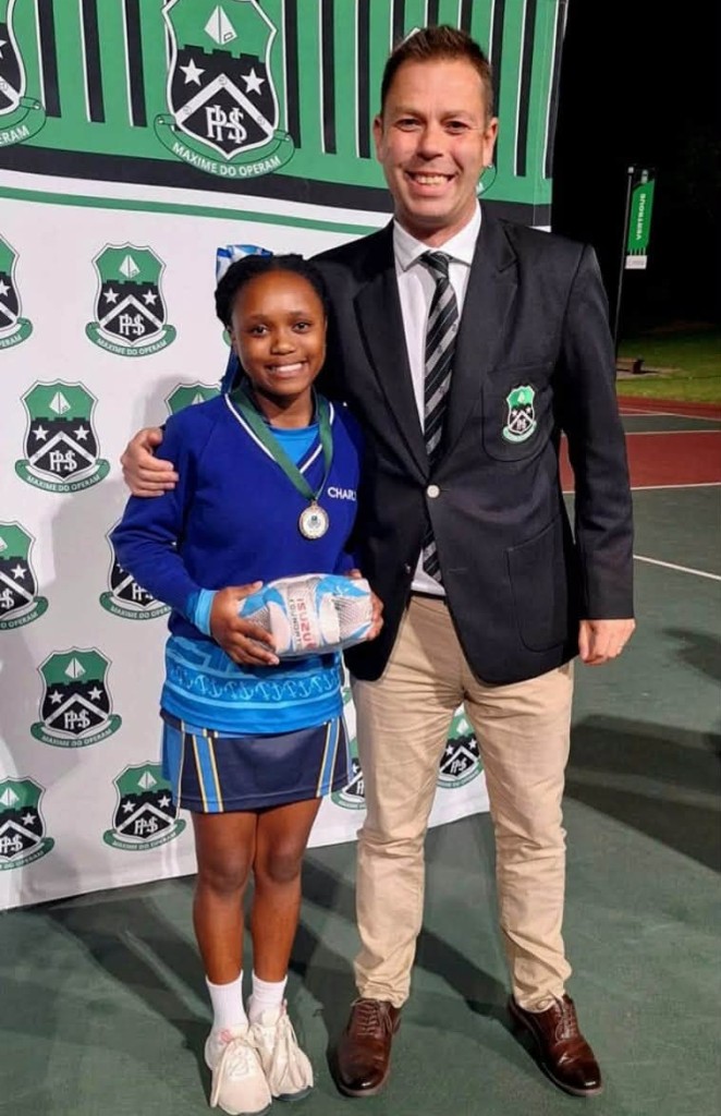 Friday Night Lights Sparkle at Pearson u-12 Hoops Netball