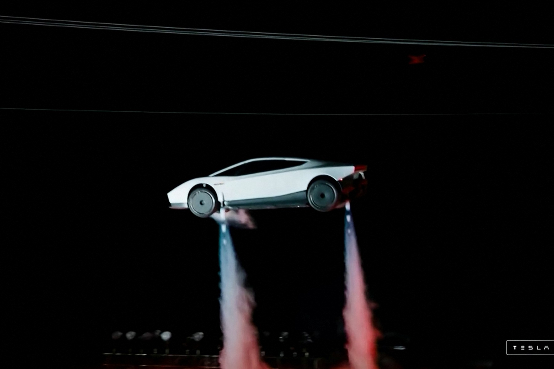 A grab taken on October 16, 2026 from a live feed released by Tesla shows the company unveiling on October 15 its next-generation Roadster electric car in McGregor, Texas, United States. Photo: Tesla | AFP