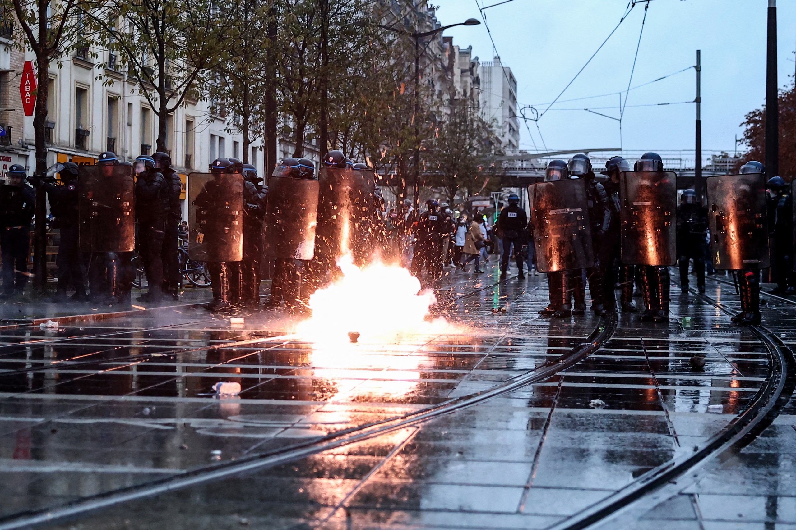 Police officers deploy during mass demonstrations in France and Spain.