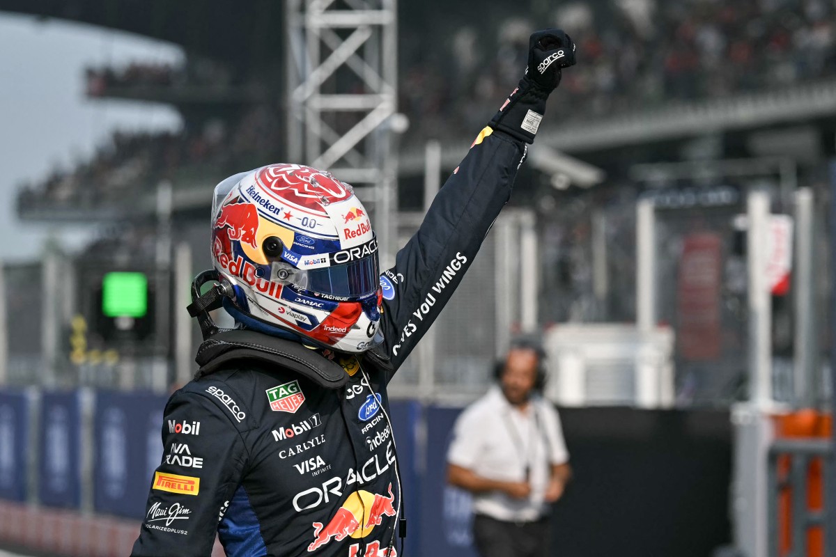 Red Bull Racing's Dutch driver Max Verstappen gestures after finishing in pole position during the qualifying session of the Formula One Bahrain Grand Prix
