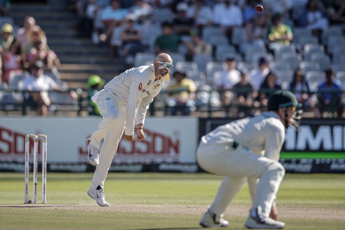 Australia's Nathan Lyon delivers a ball on day three of the third Test match between South Africa and Australia at Newlands stadium