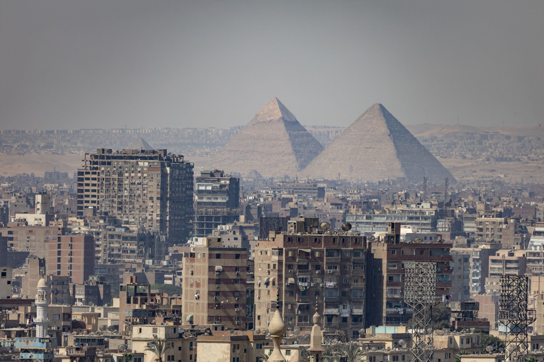 cairo cityscape with the pyramids in view