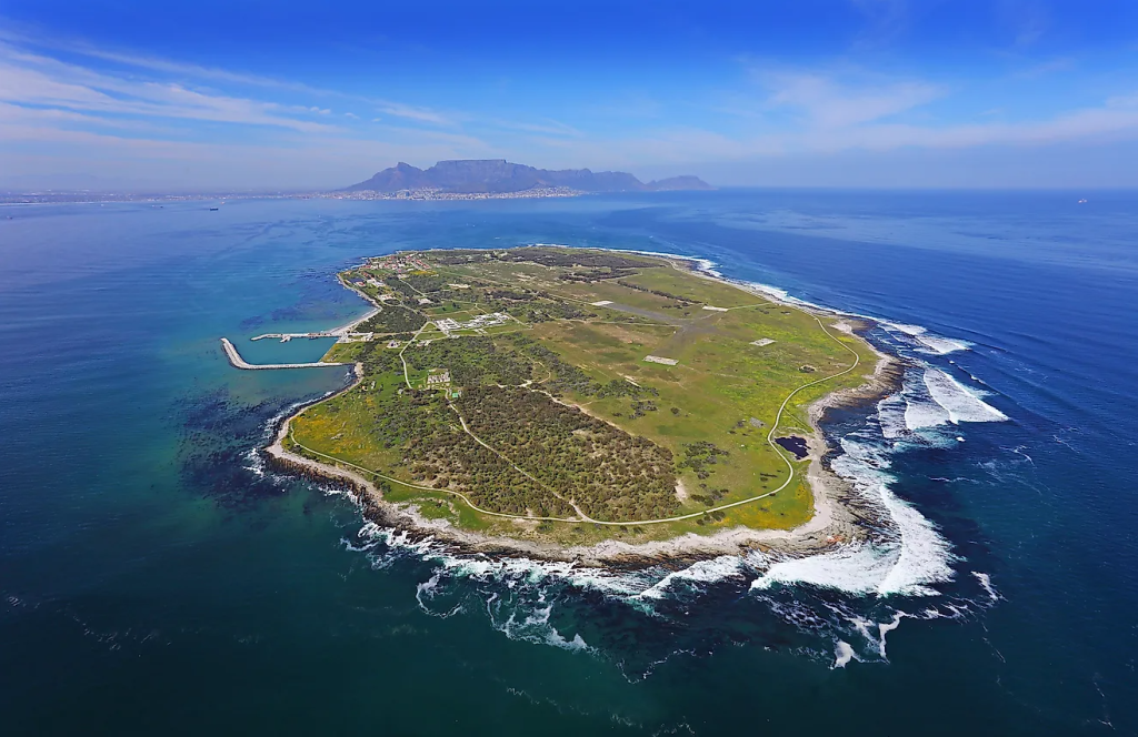aerial photo of robben island with table mountain in the background