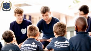 Scrummies – St Charles Grade 11s visited Grade 0s